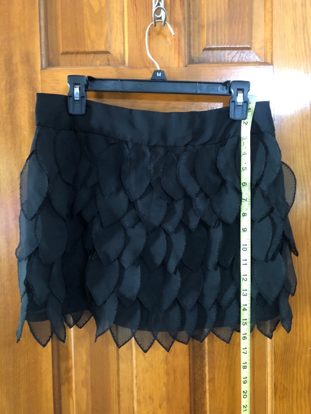 Black leafy mini skirt